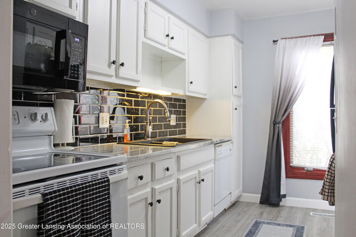 Property Photo: 688 Moorland Drive MI 48823