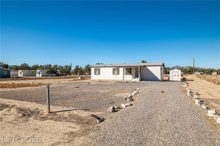 Property Photo:  2390 North Lola Lane  NV 89060 