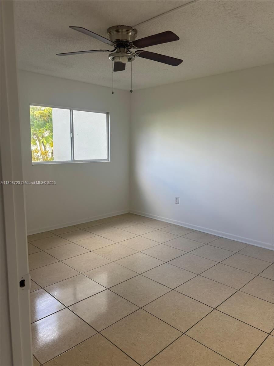 Property Photo:  1601 SW 128th Ter 111A  FL 33027