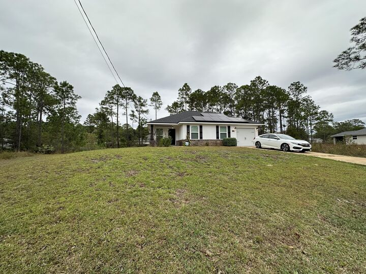 Property Photo: 5648 United Court FL 32563