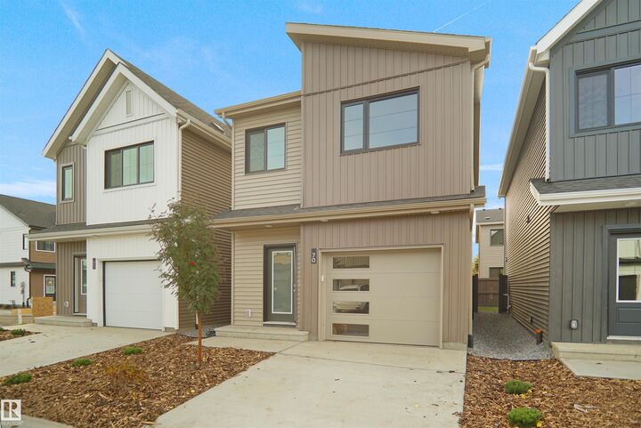 Property Photo: 1430 Aster Way NW 24 AB T6T 2N8