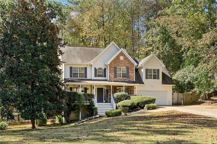 Property Photo:  7670 Rose Lane  GA 30040 