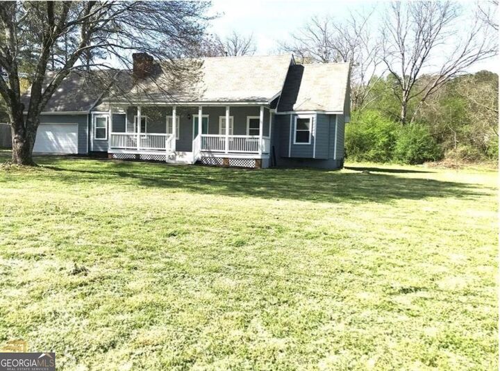 Property Photo: 6744 Rockbridge Road GA 30087