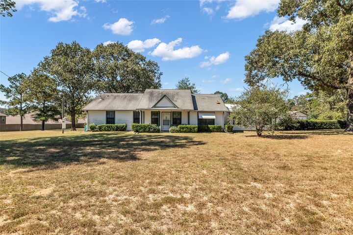 Property Photo:  13833 N Highway 75  TX 77378