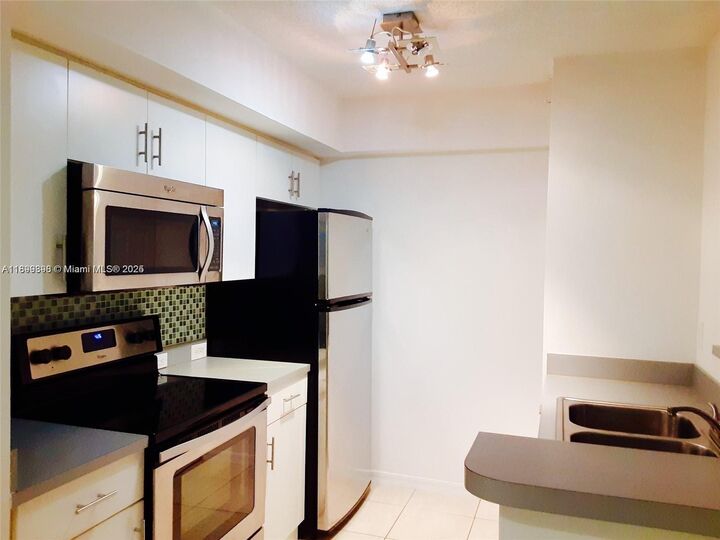 Property Photo:  620 SW 111th Ave 104  FL 33025