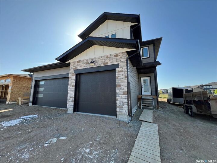 Property Photo:  727 Nazarali Union  SK S7V 1X4