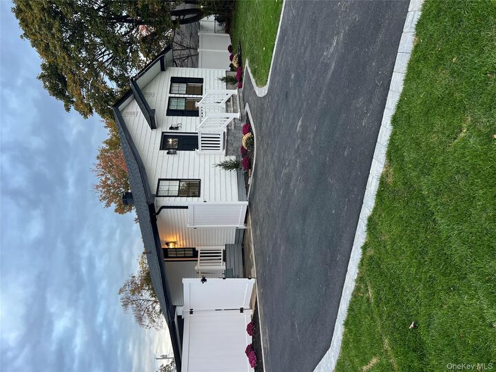 Property Photo:  53 E Elm Street  NY 11722 
