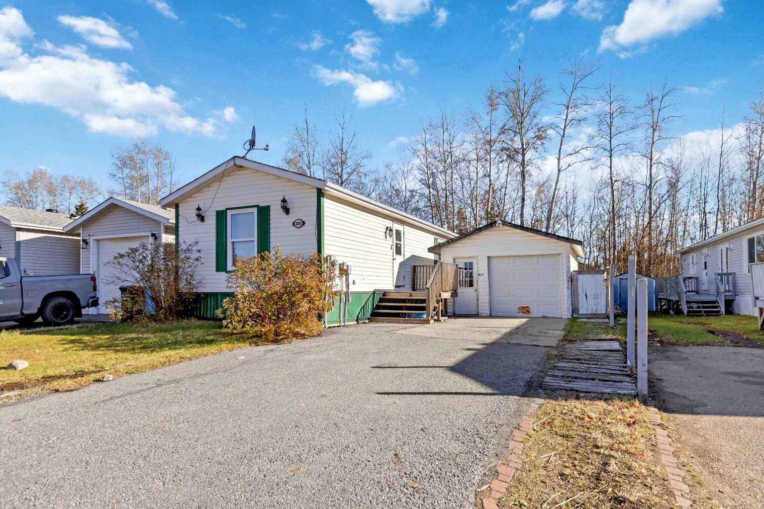 Property Photo: 200 Harpe Way AB T9K 2K8