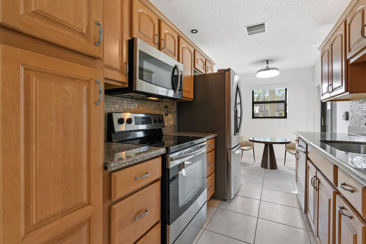 Property Photo:  5110 Nesting Way B  FL 33484