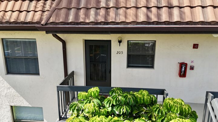 Property Photo: 7214 Golf Colony Court 205 FL 33467