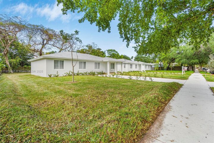 Property Photo:  933 NW 50th St  FL 33127