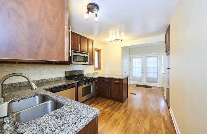 Property Photo: 3222 W Warner Avenue 1 IL 60618