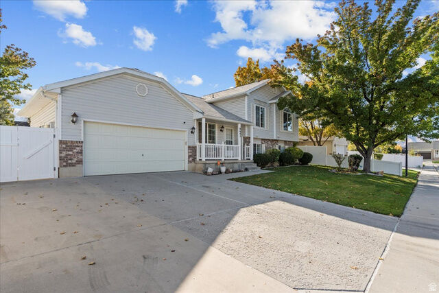 Property Photo:  6647 W Herdon Way S  UT 84128 