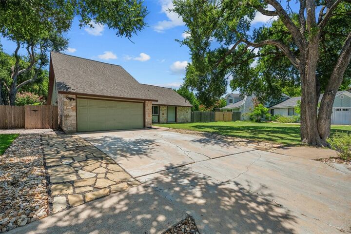 Property Photo: 10255 Missel Thrush Drive TX 78750