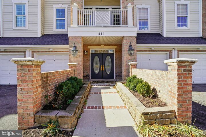 Property Photo:  411 Hamlet Club Drive 304  MD 21037