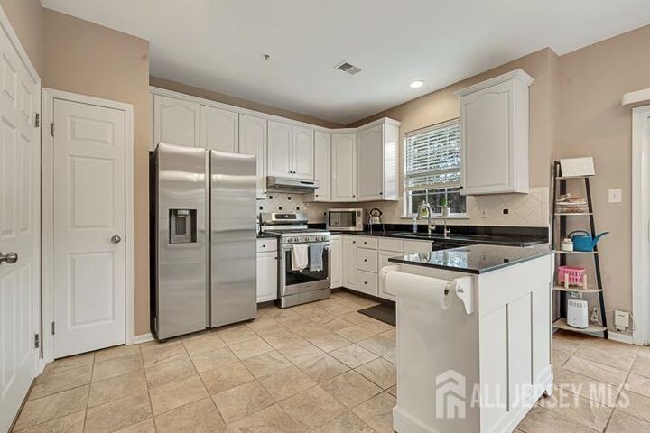 Property Photo:  111 Blossom Circle  NJ 08810