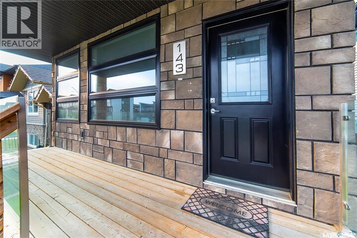 Property Photo: 143 Marlatte Crescent SK S7W 0B8