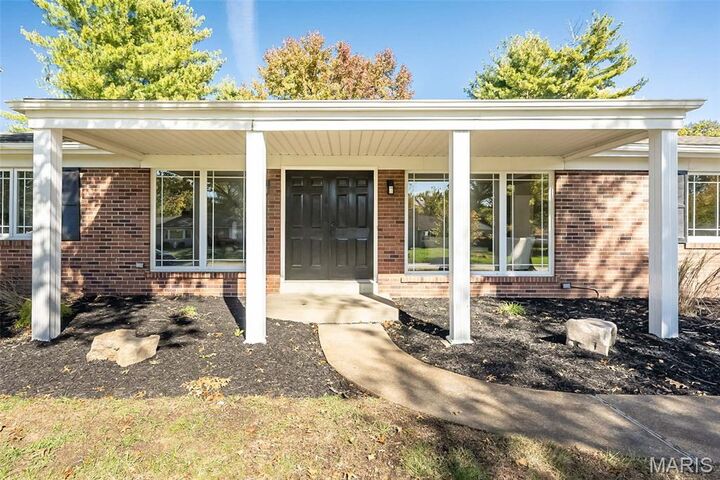 Property Photo: 10033 Carolynne Drive MO 63128