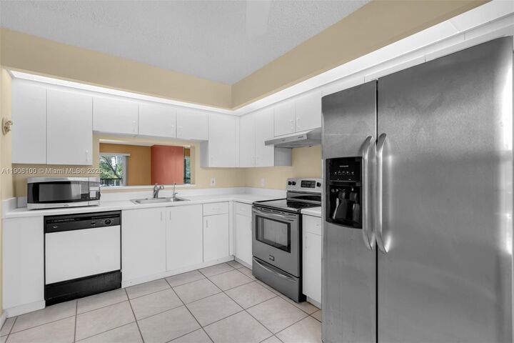 Property Photo: 550 SW 137th Ave 208L FL 33027