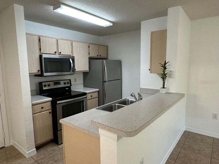 Property Photo:  5479 Vineland Road 9107  FL 32811 