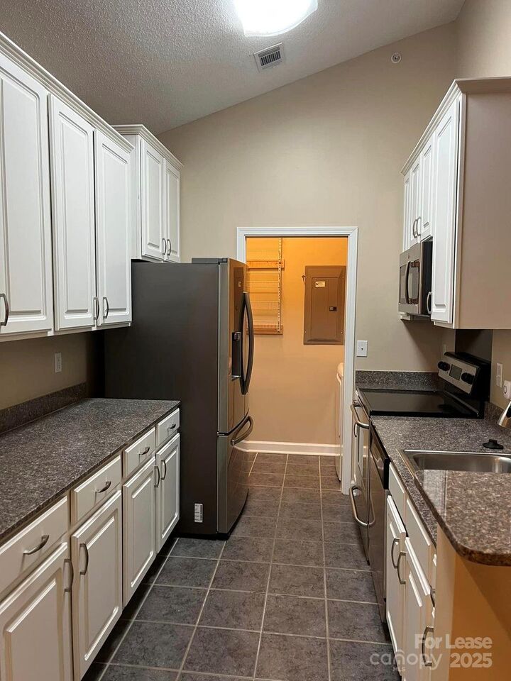 Property Photo:  2000 Old Eastwood Village Boulevard 305  NC 28803 