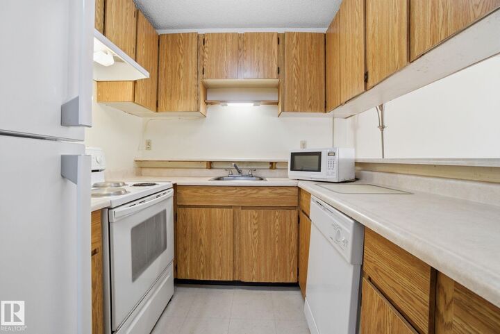 Property Photo: 2624 Mill Woods Road NW 109 AB T6L 5K7