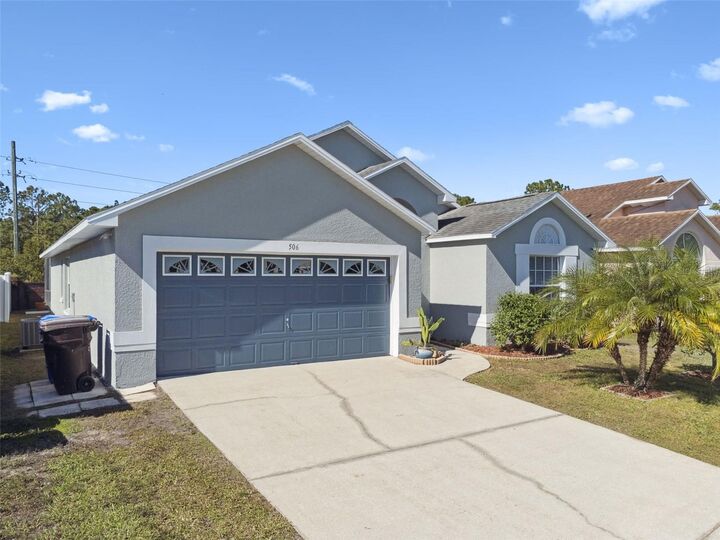 Property Photo: 506 Eagle Pointe N FL 34746