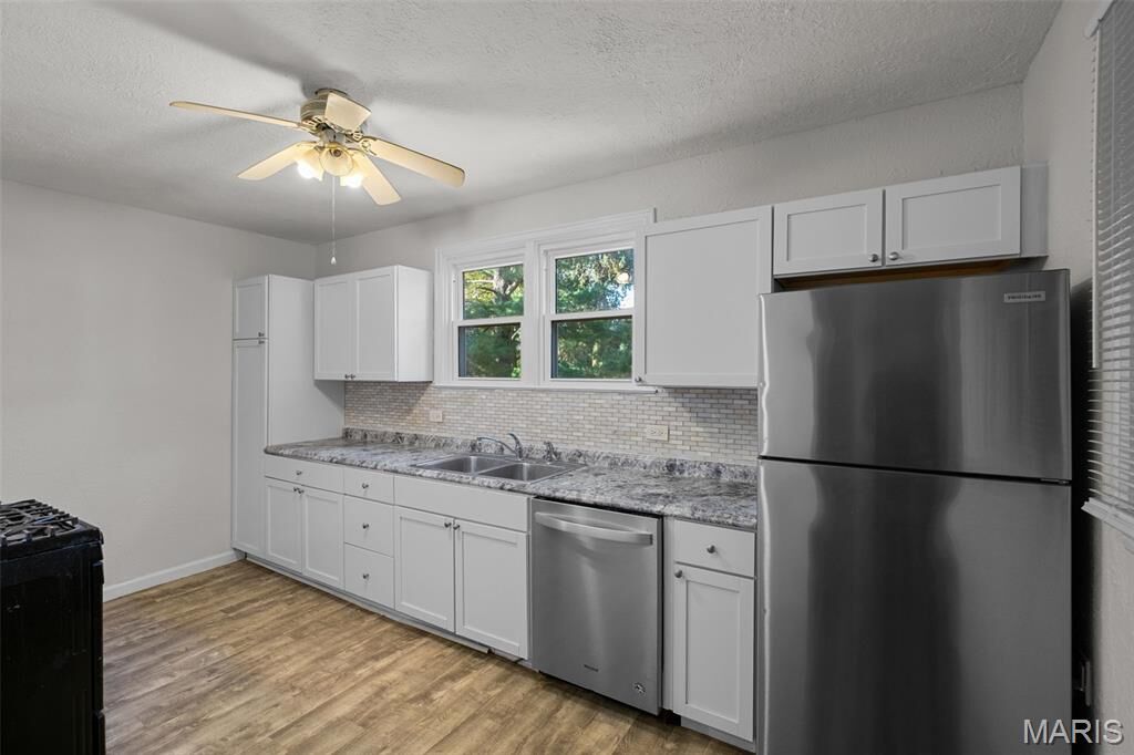 Property Photo:  847 N Florissant Road  MO 63135 