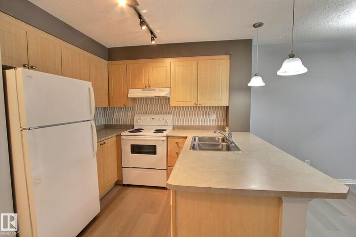 Property Photo:  616 McAllister Loop SW 416  AB T6W 1N1 