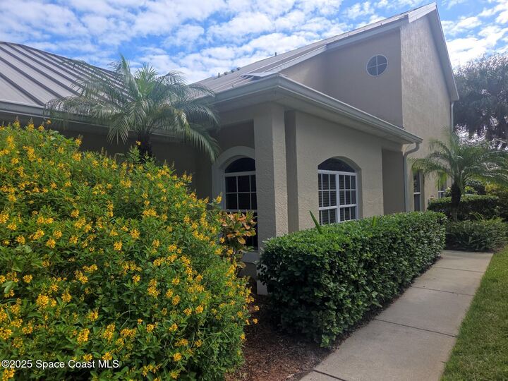 Property Photo: 115 Aquarina Boulevard FL 32951