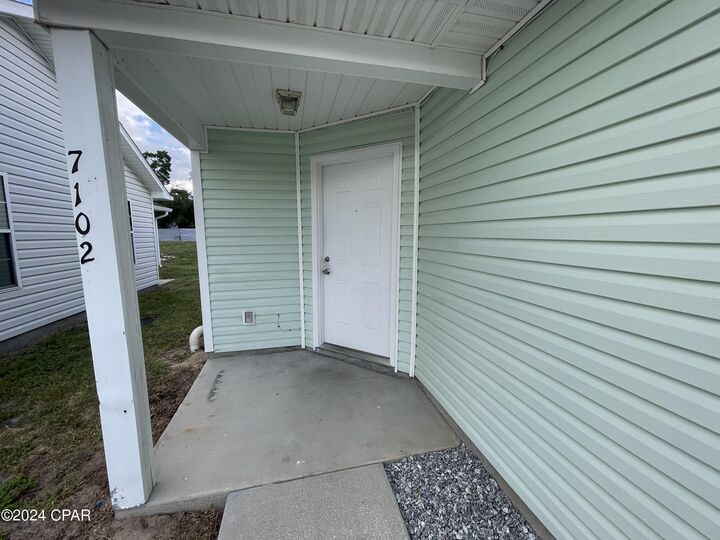 Property Photo: 7102 N Lagoon Drive FL 32408