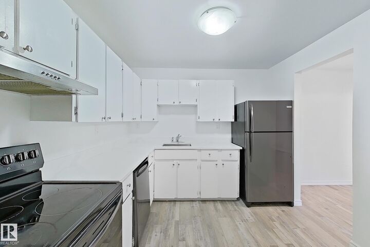 Property Photo:  1624 48 Street NW 309  AB T6L 5P1 