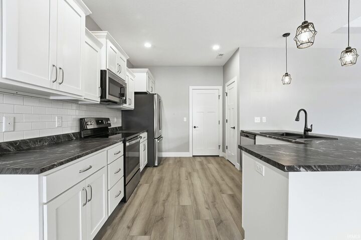 Property Photo:  7755 Tumnus Trail  IN 46835 