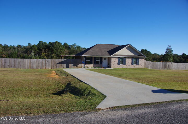 Property Photo:  8460 Mint Julep Drive  MS 39573 