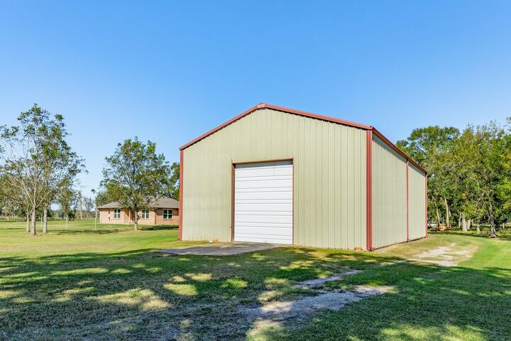 Property Photo: 1005 County Road 164 TX 77414