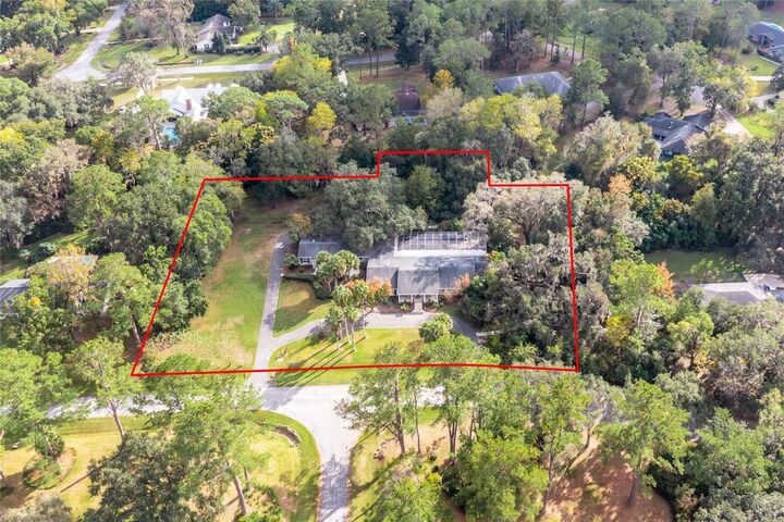 Property Photo:  7911 SW 36th Avenue  FL 32608 