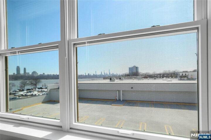 Property Photo:  905 River Road 208  NJ 07020 