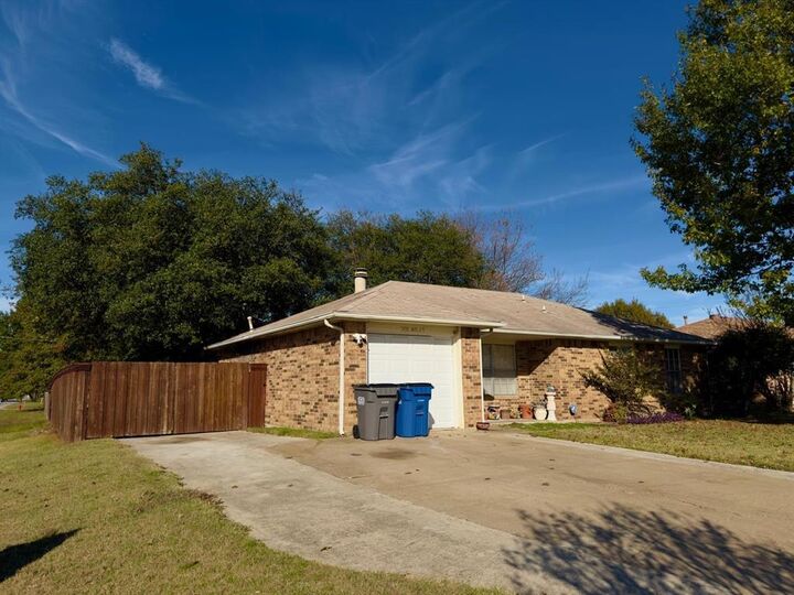 Property Photo: 301 E Milas Lane TX 75154