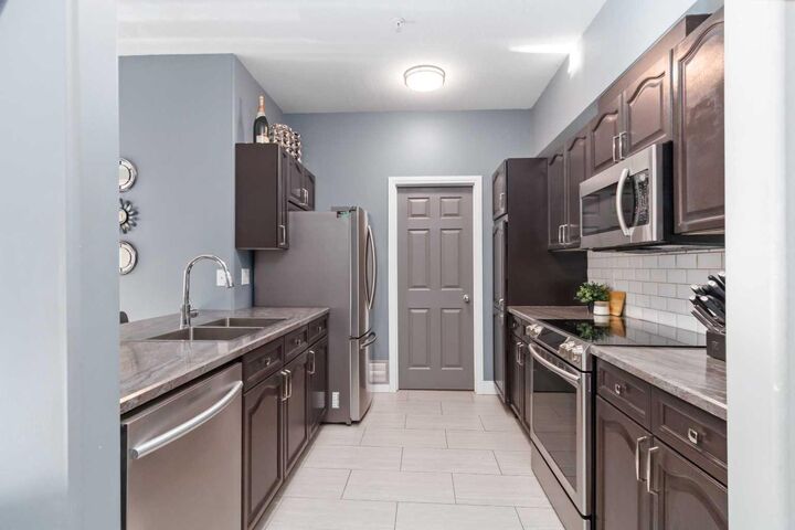 Property Photo:  290 Plamondon Drive 104  AB T9K 0A5 