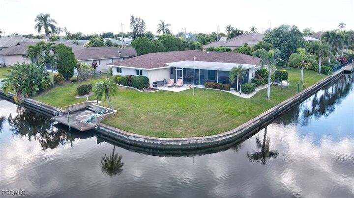 Property Photo:  3201 SE 1st Court  FL 33904 