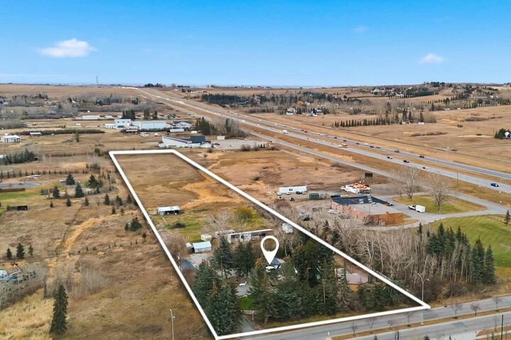 Property Photo: 12040 338 Avenue E AB T1S 1A2