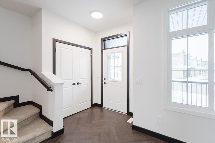 Property Photo: 2124 Crossbill Lane NW AB T6W 4V8