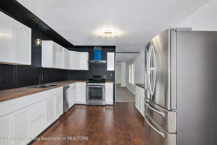 Property Photo:  3614 Cooley Drive  MI 48911 