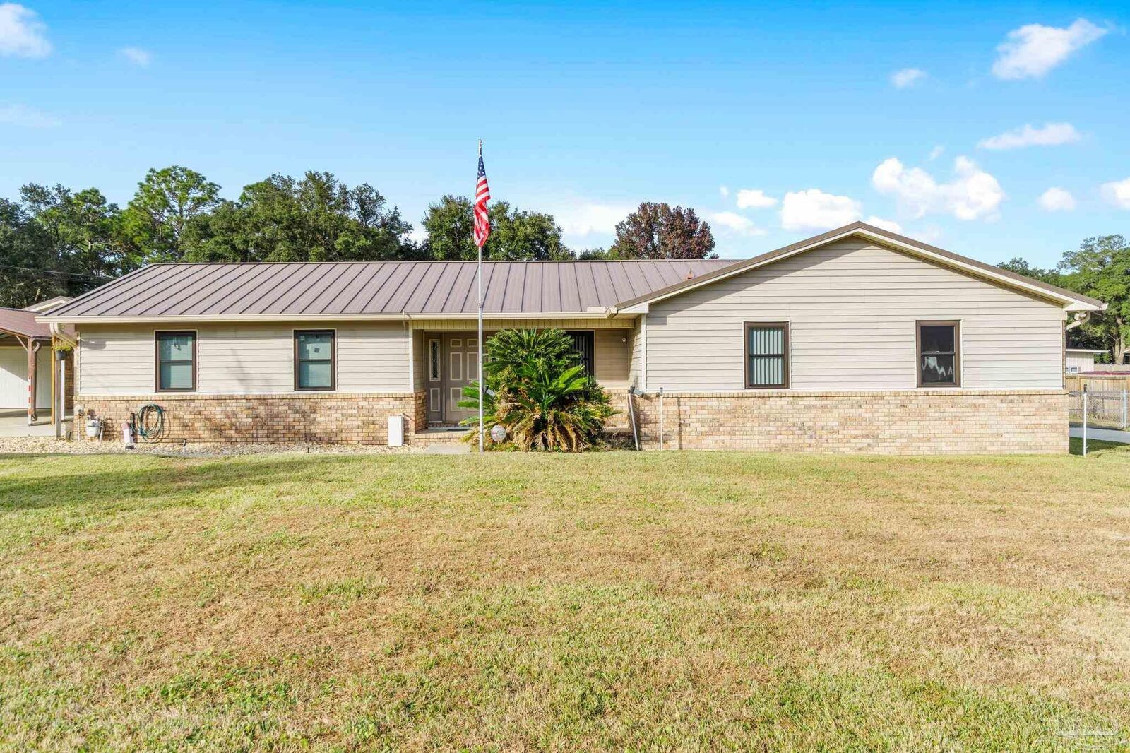 Property Photo:  7140 Belguim Cir  FL 32526 