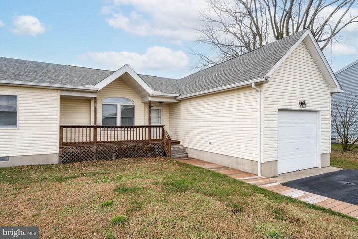 Property Photo:  206 Chapel Of Ease Street  DE 19939 