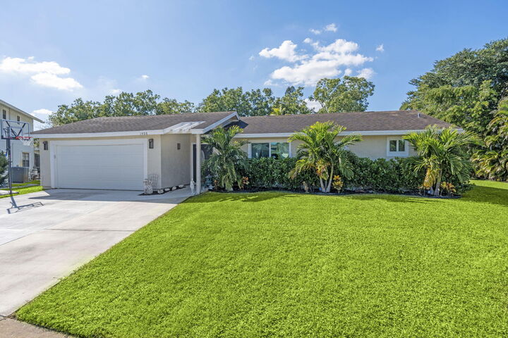 Property Photo:  1408 Old Cypress Trail  FL 33414 