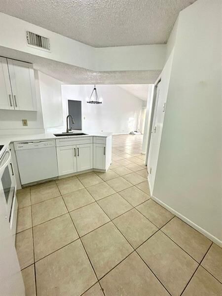 Property Photo:  9033 Wiles Rd 304  FL 33067 