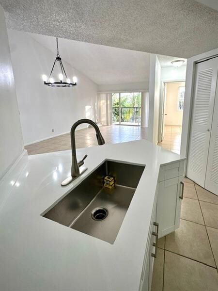 Property Photo:  9033 Wiles Rd 304  FL 33067 