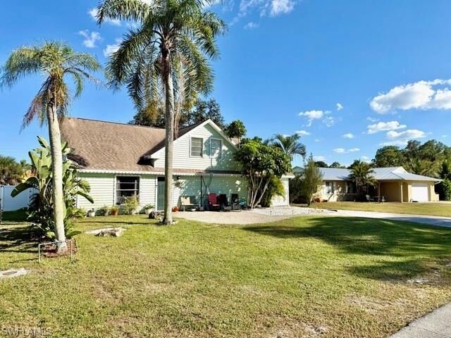 Property Photo: 27673 Los Amigos Ln FL 34135