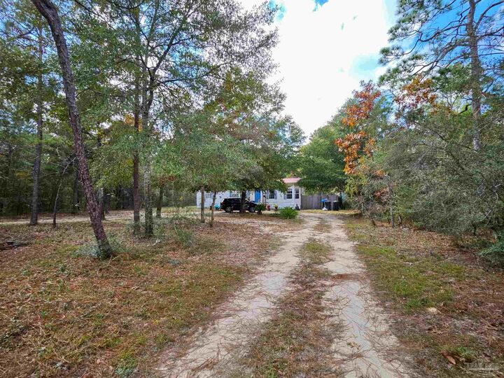 Property Photo:  203 W Picasso Cir  FL 32433 